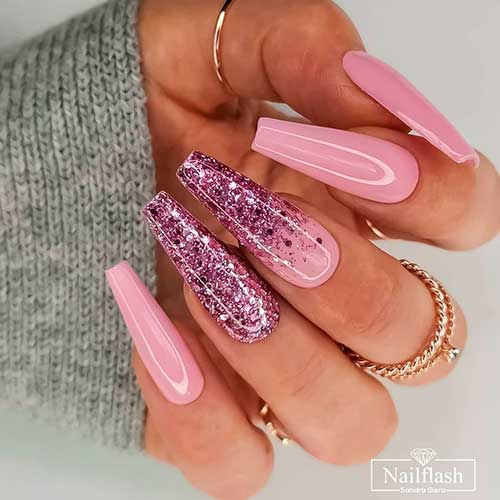 Cute light pink coffin shaped nails 2021 with purple glitter on two accent nails! Cute light pink coffin shaped nails 2021 with purple glitter on two accent nails!