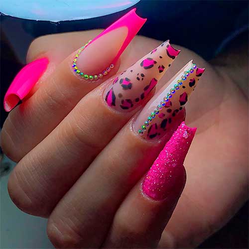 Long coffin-shaped hot pink leopard print nails 2023 with rhinestones and sugar glitter