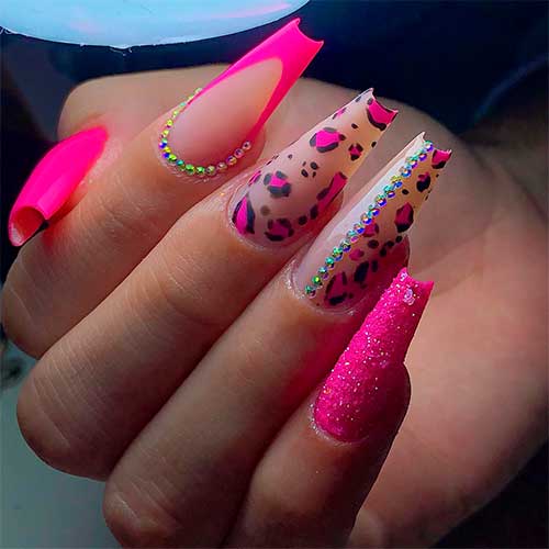 Cute Coffin Hot Pink Leopard Print Nail Design Long coffin-shaped hot pink leopard print nails 2023 with rhinestones and sugar glitter