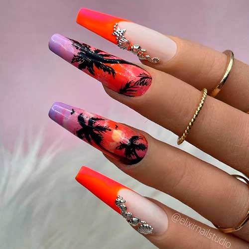 Orange French Tip Nails 2021 coffin shaped with two accent Palm Nail Art in addition to rhinestones