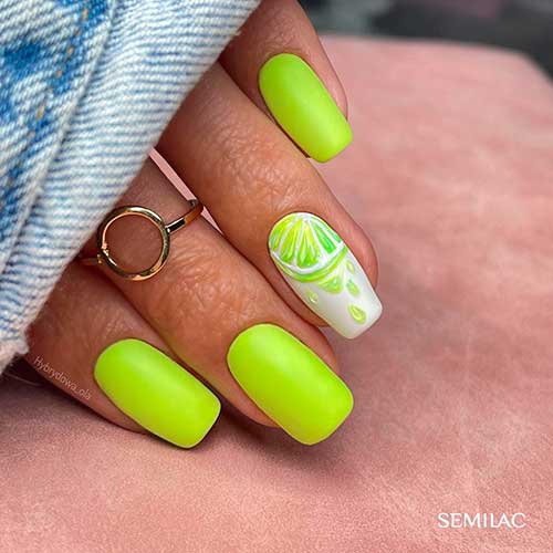 Short lime green neon nails 2021 with lime fruit nail art on accent nail for summertime!