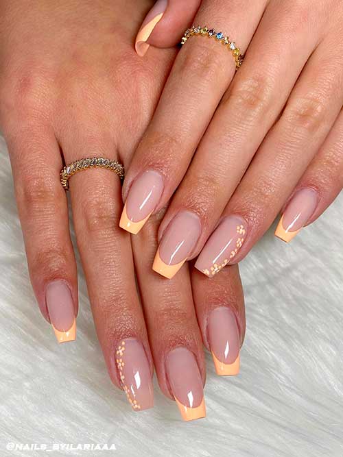 Coffin Peach French Manicure Coffin Peach French Manicure with Tiny Flowers on Ring Fingernail