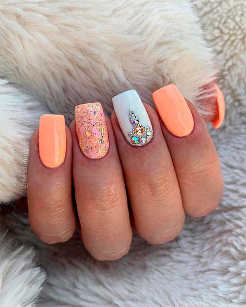 Glittering peach with white nail design Short Square peach Color Nails with Glitter Peach and Rhine-stoned White Accents