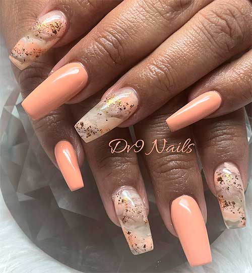 Long Coffin Shaped Peach Nail Design with Marble Accents for Summertime