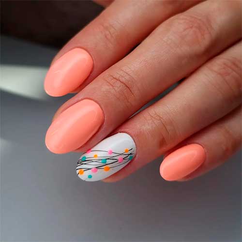 Short Peach Nail Color Design with White Accent Adorned with Colorful Abstract Nail Art