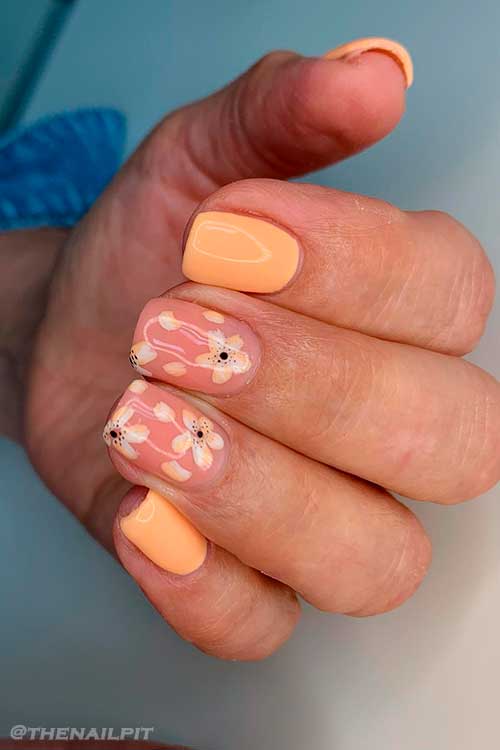 Short Square Peach Nails with Two Floral Accents for Summer 2022