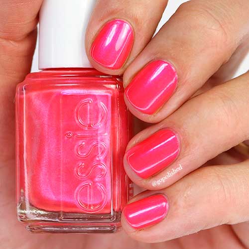 Cute short pink nail round shape with Essie nail polish pucker up for summer 2021