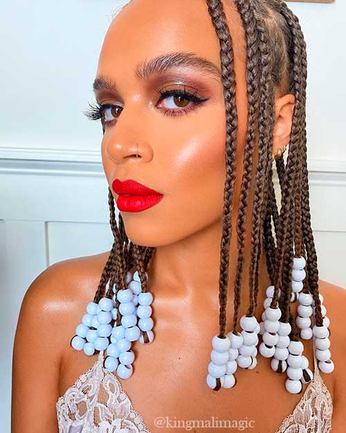 Braided Hairstyle with beads are perfect braids to try in 2021