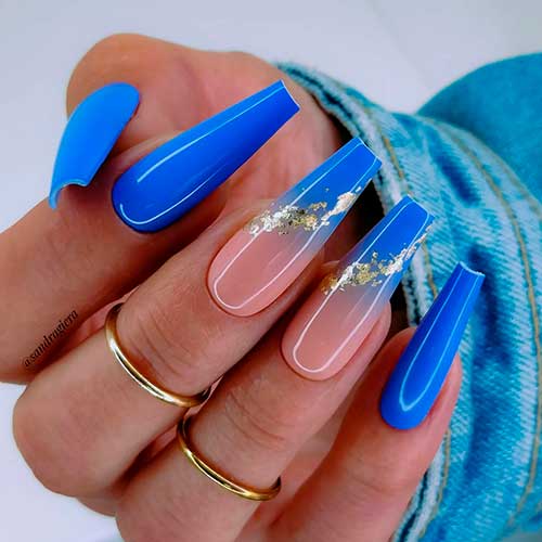 Elegant Long Coffin Royal Blue Nails 2022 with Two Royal Blue Ombre Accents are Adorned with Gold Nail Transfer Foil