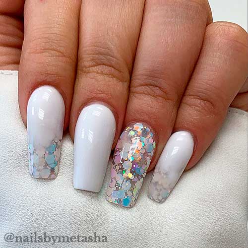 Glossy white acrylic nails coffin shaped with confetti glitter