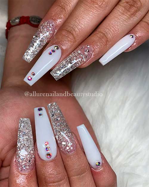 Long White Acrylic Nails with Rhinestones and Two Accent Silver Glitter over Clear Acrylics