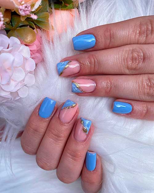Short Light Blue Nails Design with that combines the marble effect with gold foil transfer on two accents