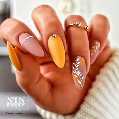 Yellow and Nude Autumn Nails with Leaf Nail Art is Perfect Fall Nails 2021