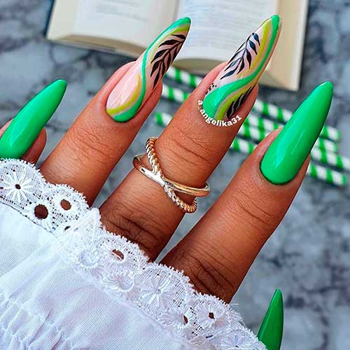 Bright hybrid green nails design with fall leaves over long almond shaped nails 2021