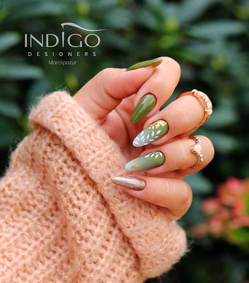 Gel Polish Martini Olive Green with Gold Glossy olive green nails almond shaped with two accent olive green ombre nails adorned with white fall leaves and gold polish