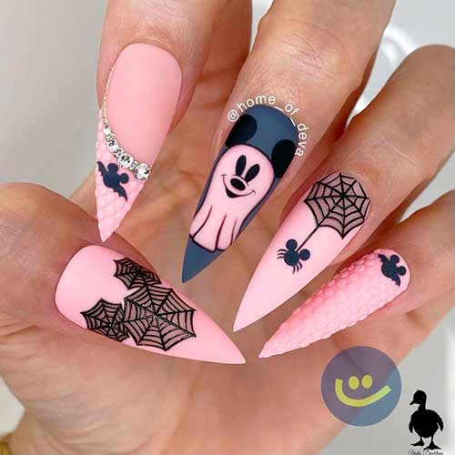 Pink Little Ghost Halloween Nails 2021 are the most feminine Halloween nail designs to try in 2021