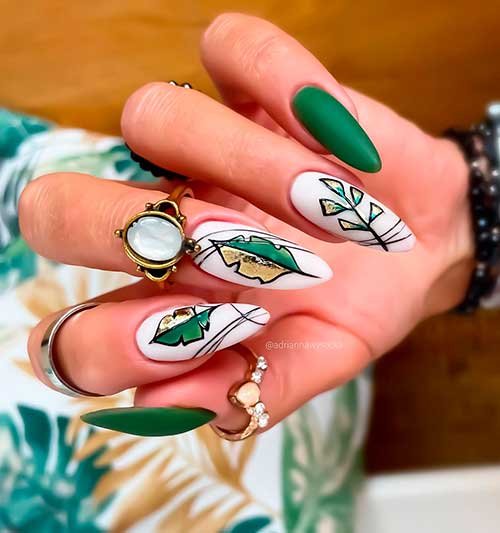 Fall almond forest green nails 2021 and white nails that adorned with green, black and gold fall leaves design