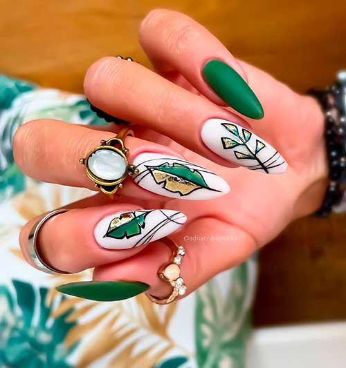 Boho Vibes Leave' Design Fall almond forest green nails 2021 and white nails that adorned with green, black and gold fall leaves design