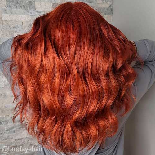 Wavy Copper Hair Color; One of the charming Fall Hair Colors 2021 that worth trying