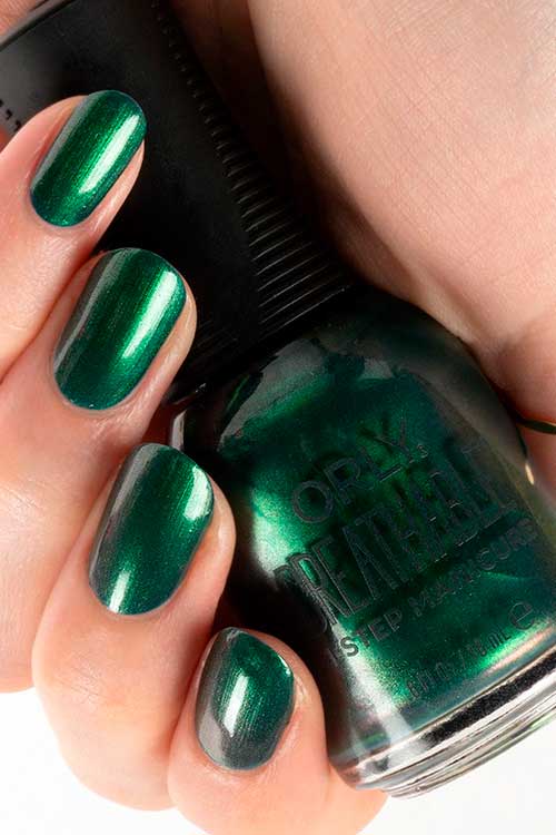 short shimmer emerald green nails with Do A Beryl Roll ORLY Breathable Nail Polish