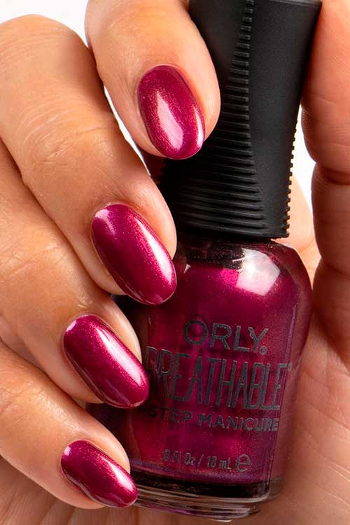 Don’t Take Me For Garnet Short round deep plum shimmer nails with Don’t Take Me For Garnet ORLY Breathable Nail Polish