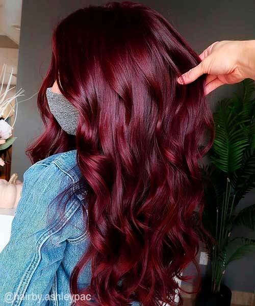 Long wavy Burgundy Hair Color is One of the gorgeous Autumn Hair Colors to Try