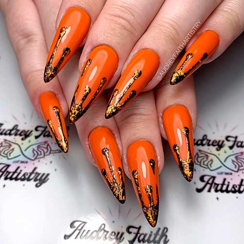 Halloween burnt orange nails with black and gold Dripping Tips Nail Art Design for Halloween 2021