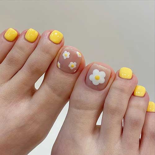 Bright Yellow Pedicure Idea with Daisy Flowers
