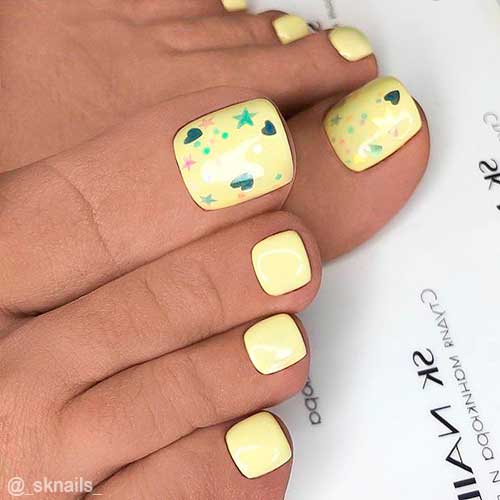 Light Yellow Pedicure with Minor Shape Arts on Big Toenails