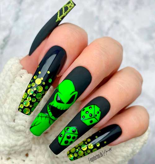 Black and green coffin nightmare before Christmas nails with glitter on two accent nails for Halloween 2021