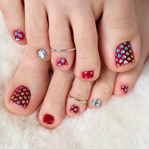 Red Valentine's pedicure with holo heart glitter Red Valentine's pedicure with holo heart glitter