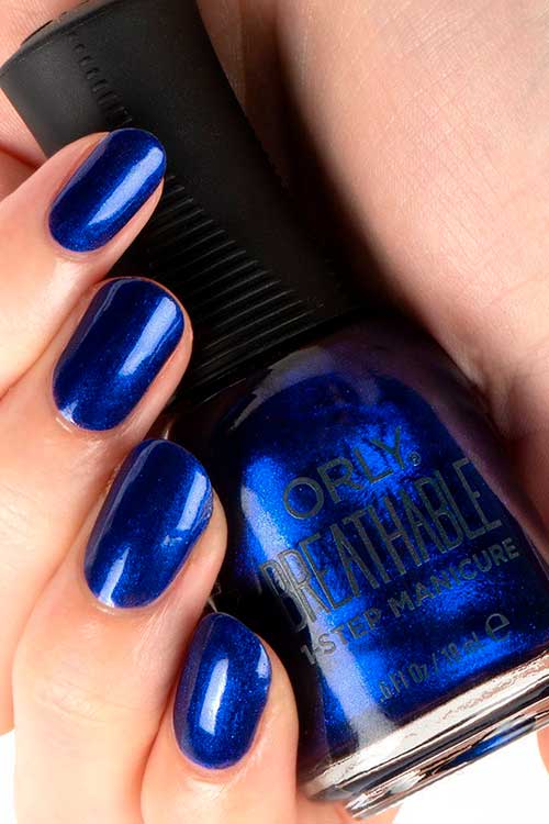 You’re On Sapphire ORLY Breathable Nail Polish Short cobalt blue shimmer with You’re On Sapphire ORLY Breathable Nail Polish
