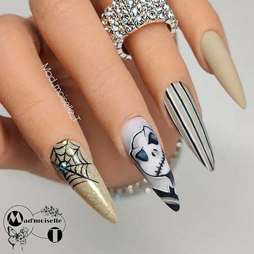 jack o lantern nail design stiletto shaped with spider web and striped nails for Halloween 2021