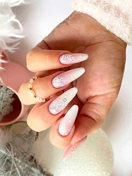 Baby Boomer Nails with Snowflakes Long Almond-Shaped Baby Boomer Nails with Snowflakes, Glitter, and Rhinestones