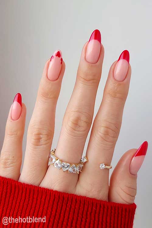 Cute Valentine Red French Tip Nails with Accent Hearts Nail Design