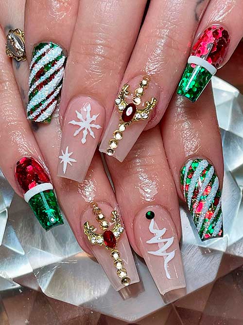Medium Coffin Shaped Festive Red and Green Nails with Two Nude Accent Nails Adorned with Rhinestones and Snowflakes