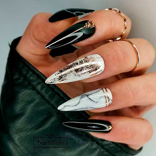Marble Stiletto Black and White Nails with Gold Strips, Rhinestones, and Gold patches