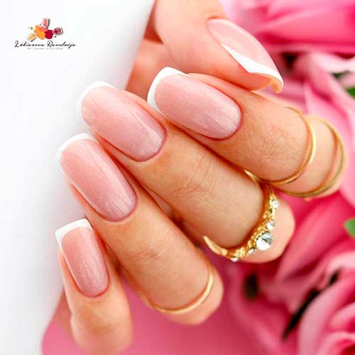 Shimmery Gel Nude Base Color With White French Tips 2021 on Square Nail Shape