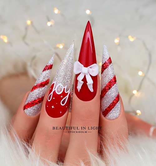 Stiletto Red and Silver Candy Cane Nails are Perfect Christmas Nails 2021 to Wear