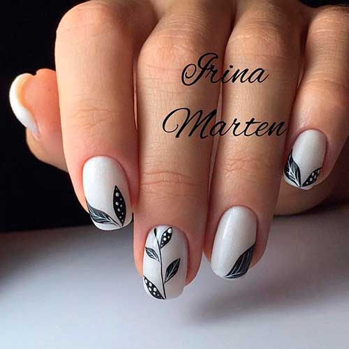 Short Square White Base With Black Leaf Nail Art