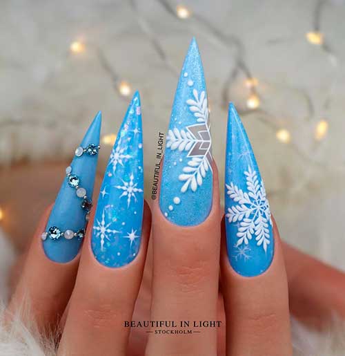 Winter Ice Blue Nails with White Snowflakes Winter Shimmer Ice Blue Nails with White Snowflakes and Rhinestones for Winter Season