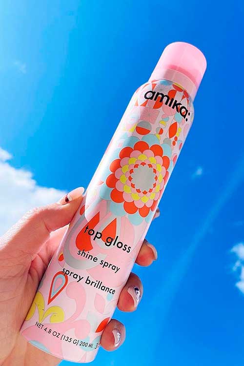 Amika Top Gloss Shine Spray is a new hair shine spray that fights frizz and gives hair shine