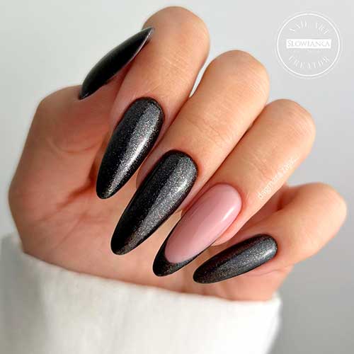 Elegant Shimmer Black Manicure with French Accent Nail - Stunning black nail designs 2022