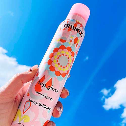 Amika Top Gloss Shine Spray is a new hair shine spray that fights frizz and gives hair shine