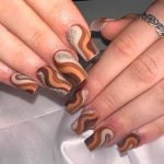 The Best Brown Nails To Elevate Your Style In 2024 Different Shades Of Brown Swirl Nails 150x150