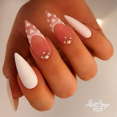 Gorgeous Long Almond White Valentines Day Nails 2022 with Hearts and Rhinestones on Two French Tip Accents