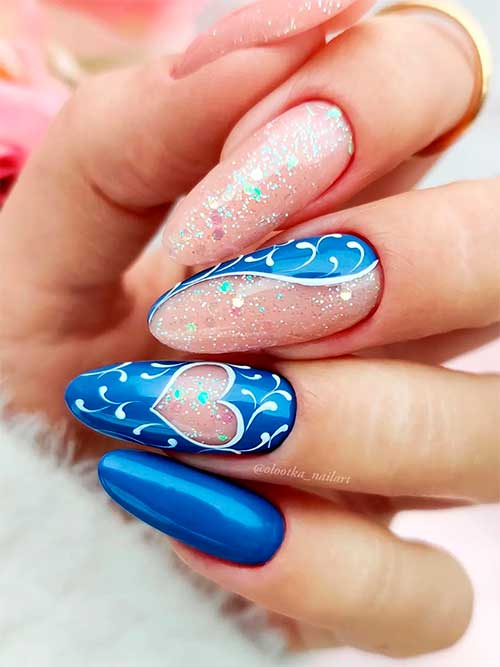 Long almond royal blue and glitter pink valentines day nails with abstract white nail art