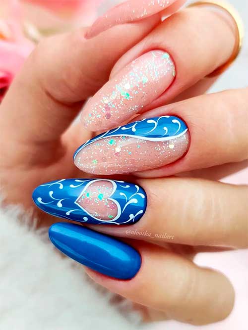 Long almond royal blue and glitter pink valentines day nails with abstract white nail art Long almond royal blue and glitter pink valentines day nails with abstract white nail art