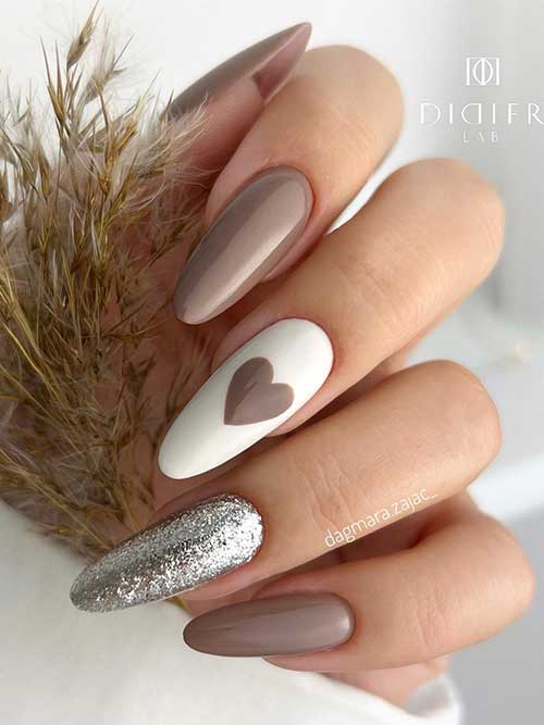 Valentine’s Light Brown Nails Long almond-shaped light brown nails 2023 with heart shape and silver accent nails