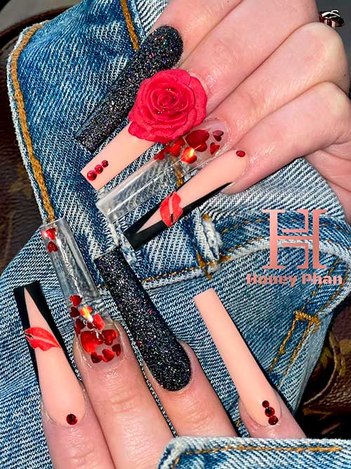 Long coffin matte nude and black valentine's day nails with glitter, metallic hearts, and rhinestones design